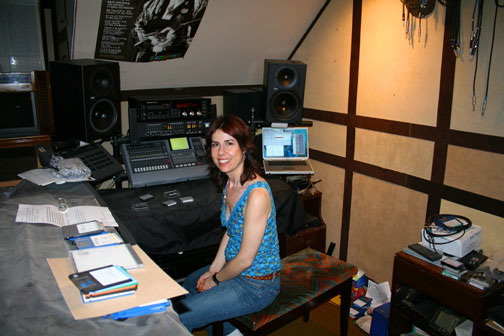Dr. Lisajean, in from San Diego, listening to a mix of her band in my studio.