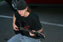 Floyd Jr. With his new axe.  Not only is he a kickass drummer, he's doing things on the guitar that I can't do!