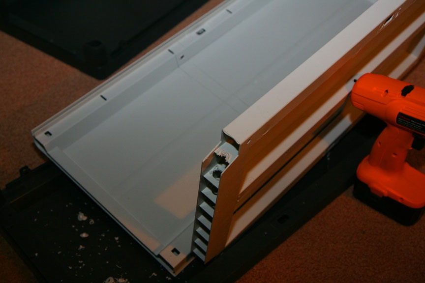 16- I drilled a hole into the support ribs of the shelf to run wires through.